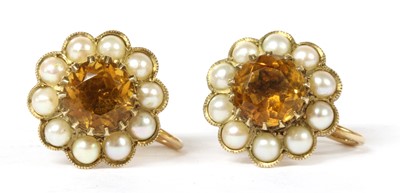 Lot 411 - A pair of 9ct gold citrine and split pearl cluster earrings