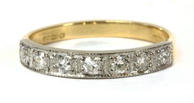 Lot 192 - An 18ct gold diamond half eternity ring