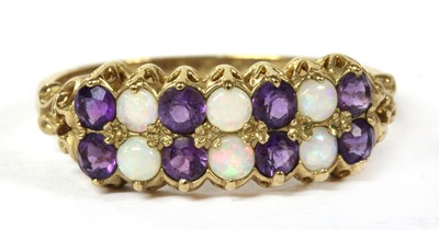 Lot 121 - A 9ct gold opal and amethyst ring