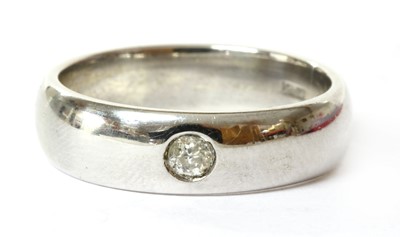 Lot 114 - A white gold diamond set band ring