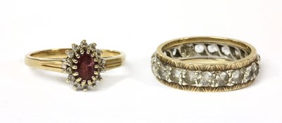 Lot 342 - A 9ct gold ruby and diamond cluster ring