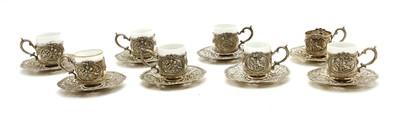 Lot 55 - A set of German silver coffee can holders and saucers