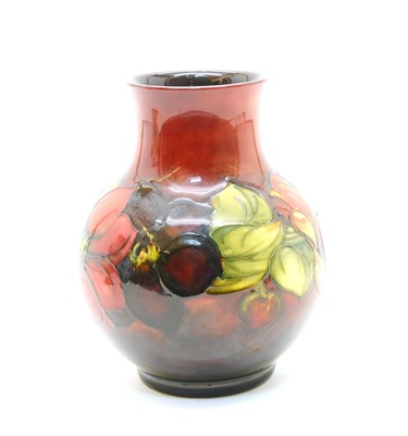Lot 385 - A Walter Moorcroft Flambe Clematis vase