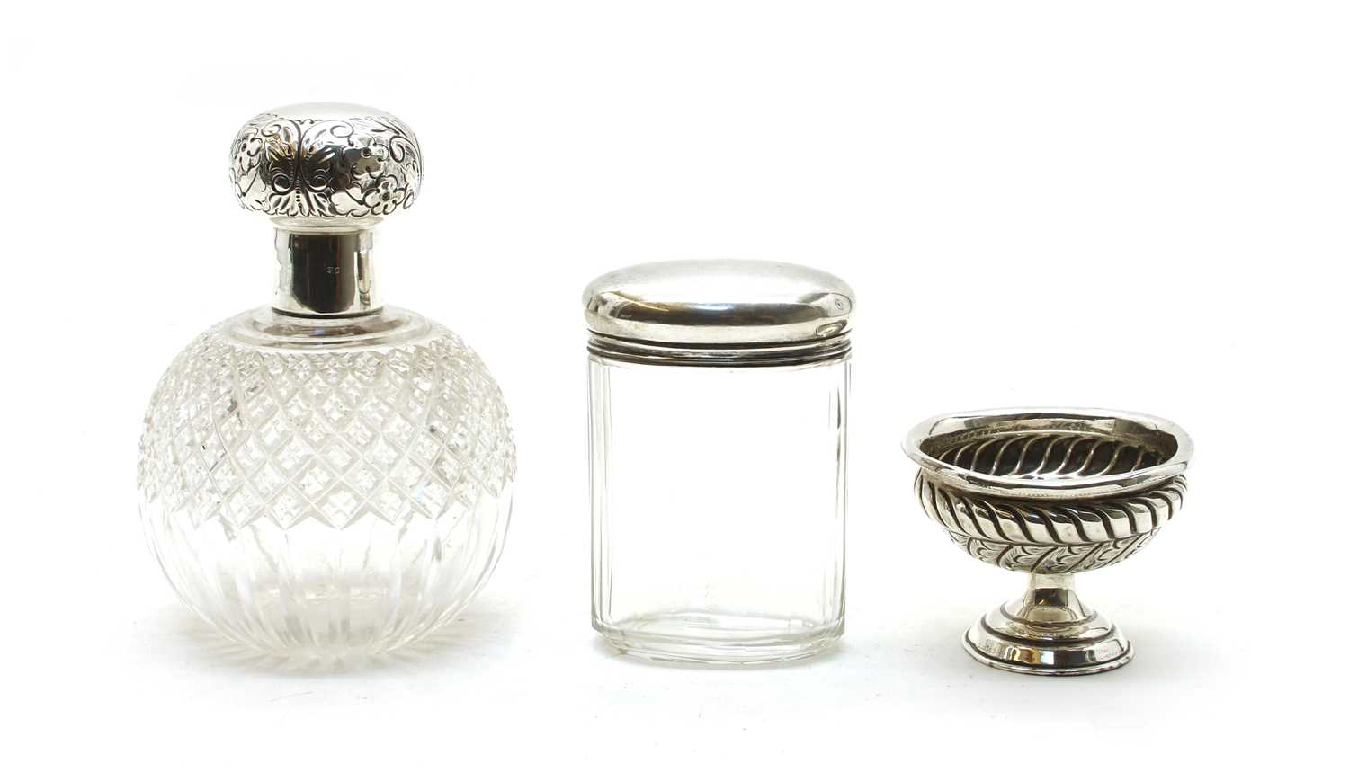 Lot 4 - Two silver mounted cut glass dressing table bottles