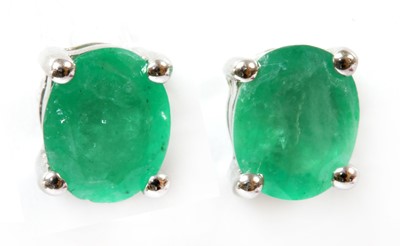 Lot 198 - A pair of white gold emerald stud earrings