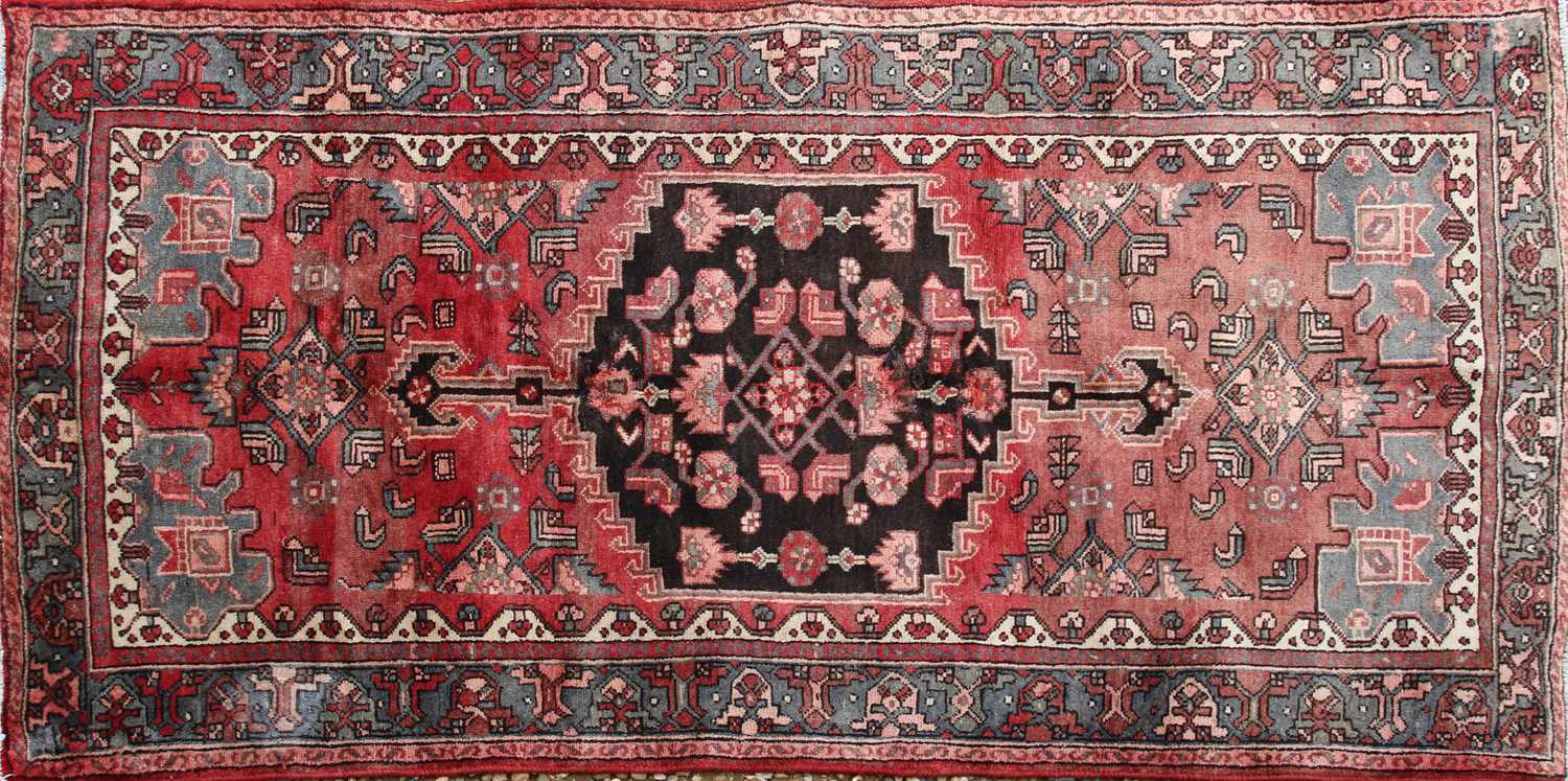 Lot 531 A Persian rug,