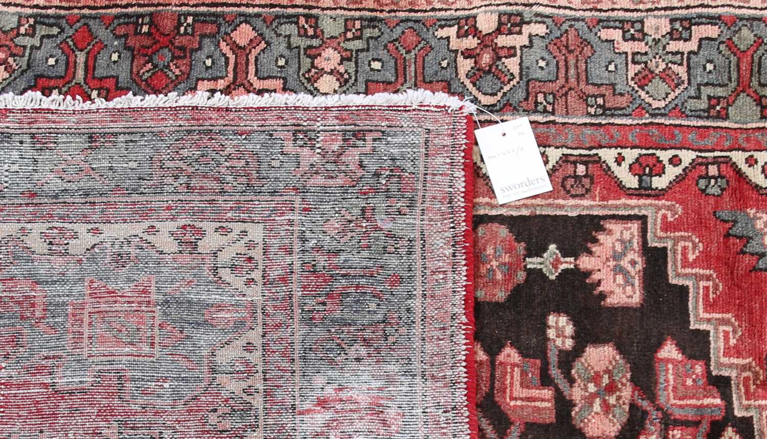 Lot 531 A Persian rug,