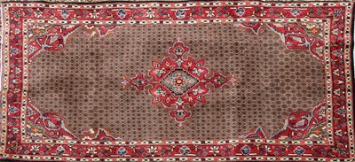 Lot 387 - A Persian wool rug