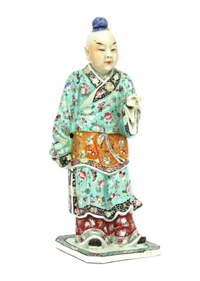 Lot 153 - A Chinese famille rose figure