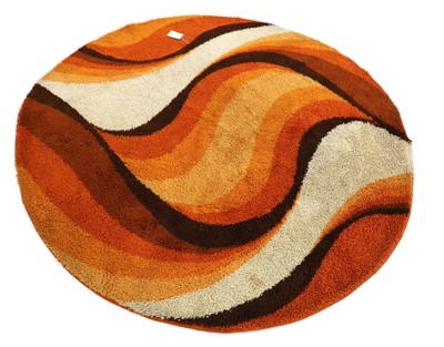 Lot 199 - An orange, brown and beige wool carpet