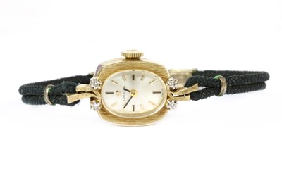 Lot 469 - An American gold Omega diamond set cocktail watch, c.1960