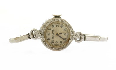 Lot 467 - An American platinum Bulova diamond set cocktail watch