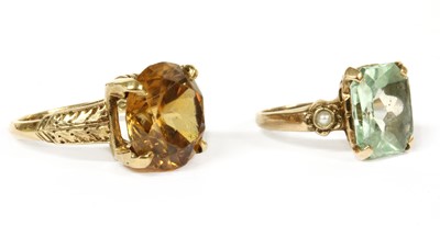 Lot 184 - An American gold single stone orange zircon ring
