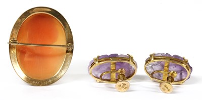 Lot 1406 - A pair of gold amethyst earrings