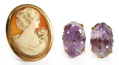 Lot 1406 - A pair of gold amethyst earrings