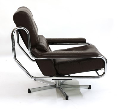 Lot 564 - A Pieff brown leather and chrome lounge chair