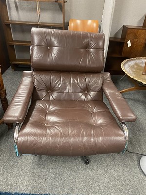 Lot 564 - A Pieff brown leather and chrome lounge chair