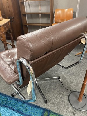 Lot 564 - A Pieff brown leather and chrome lounge chair