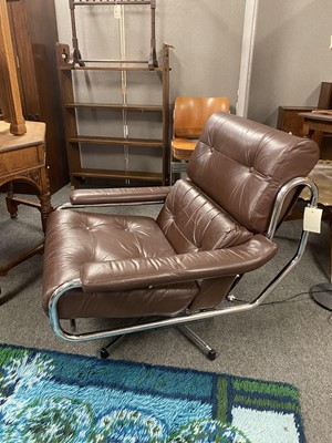 Lot 564 - A Pieff brown leather and chrome lounge chair