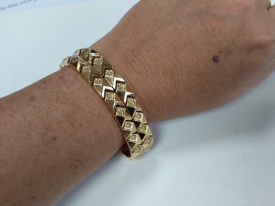 Lot 184 - An Italian gold, two row chevron link bracelet, c.1960