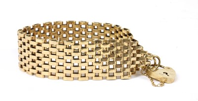 Lot 117 - A 9ct gold six row gate bracelet