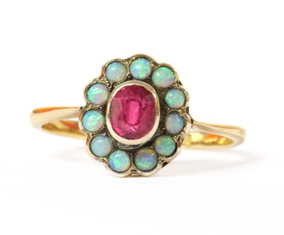 Lot 274 - A gold ruby and opal cluster ring