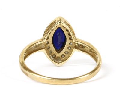 Lot 203 - A gold sapphire and diamond cluster ring