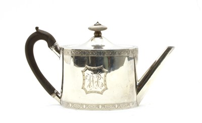 Lot 28 - George III silver teapot