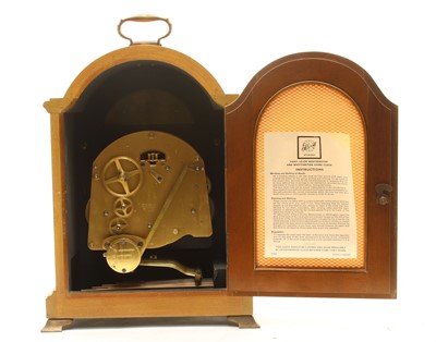 Lot 135 - A George III design burr walnut bracket clock