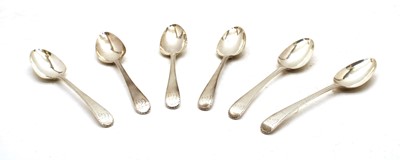 Lot 11 - A set of six George III bright cut silver table spoons