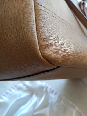 Lot 77 - A Coach tan leather tote bag