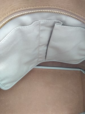 Lot 77 - A Coach tan leather tote bag