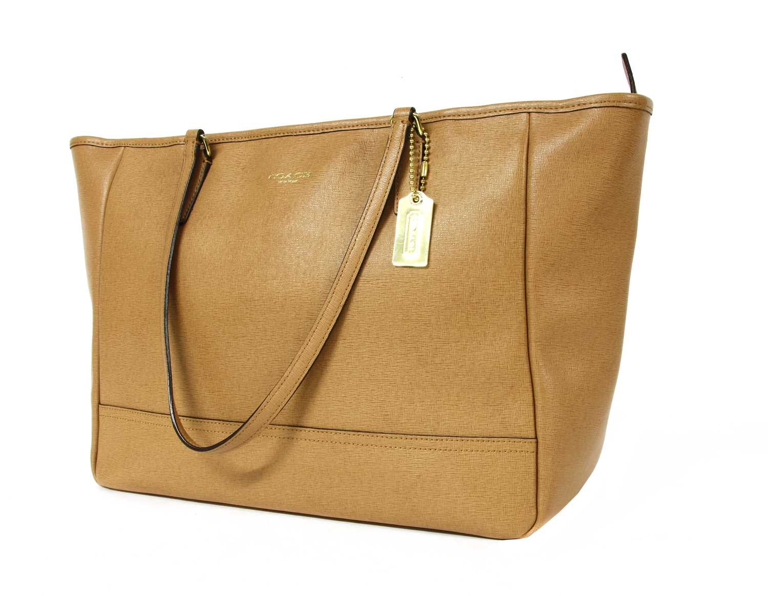 Lot 77 - A Coach tan leather tote bag