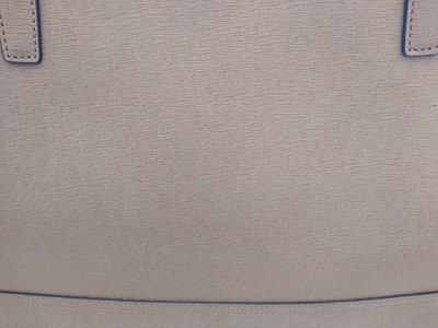 Lot 77 - A Coach tan leather tote bag