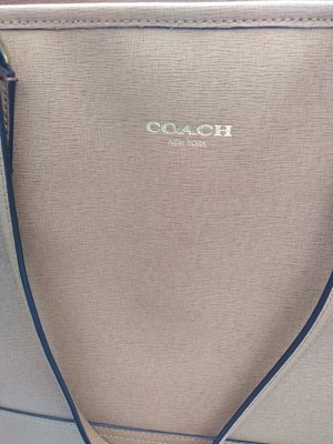 Lot 77 - A Coach tan leather tote bag