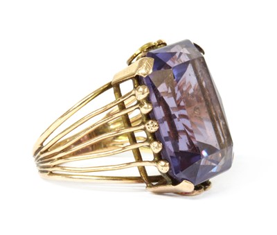 Lot 303 - A single stone synthetic colour change sapphire ring