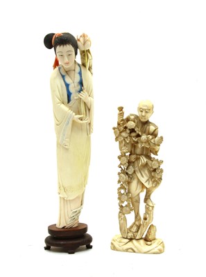 Lot 380 - Two Japanese carved ivory figures