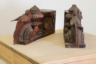 Lot 210 - A pair of Indian carved teak corbels