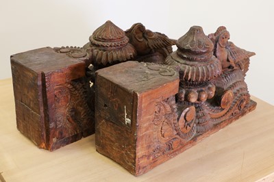 Lot 210 - A pair of Indian carved teak corbels