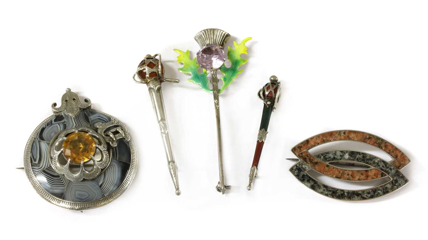 Lot 44 - A quantity of Scottish silver brooches