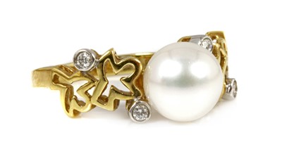 Lot 234 - A Continental gold cultured pearl and diamond ring