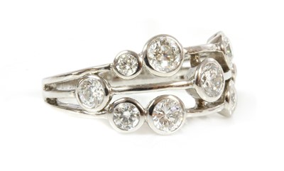 Lot 347 - An 18ct white gold diamond set tapered band ring