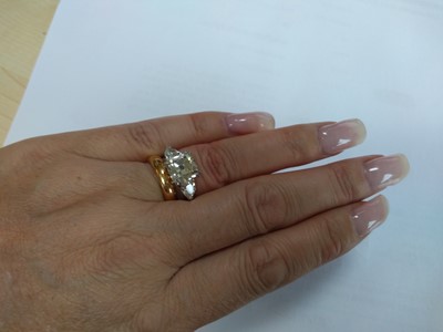Lot 40 - An 18ct white gold three stone diamond ring