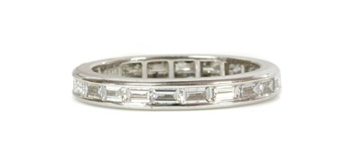 Lot 406 - An 18ct white gold diamond set full eternity ring