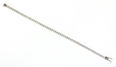 Lot 418 - An 18ct white gold diamond set Mirage line bracelet