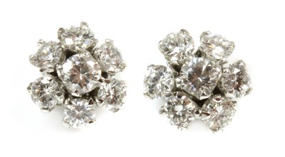 Lot 426 - A pair of white gold diamond set cluster earrings