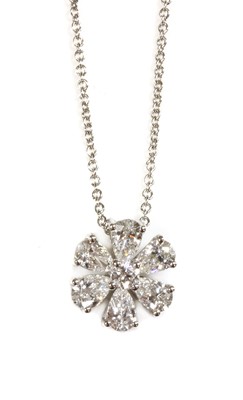 Lot 424 - An 18ct white gold diamond set cluster pendant