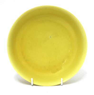 Lot 397 - A Chinese yellow-glazed dish