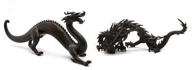Lot 235 - A Japanese bronze model of a dragon glancing behind with an open mouth