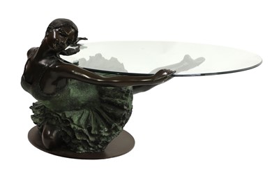 Lot 398 - A patinated bronze ballerina coffee table